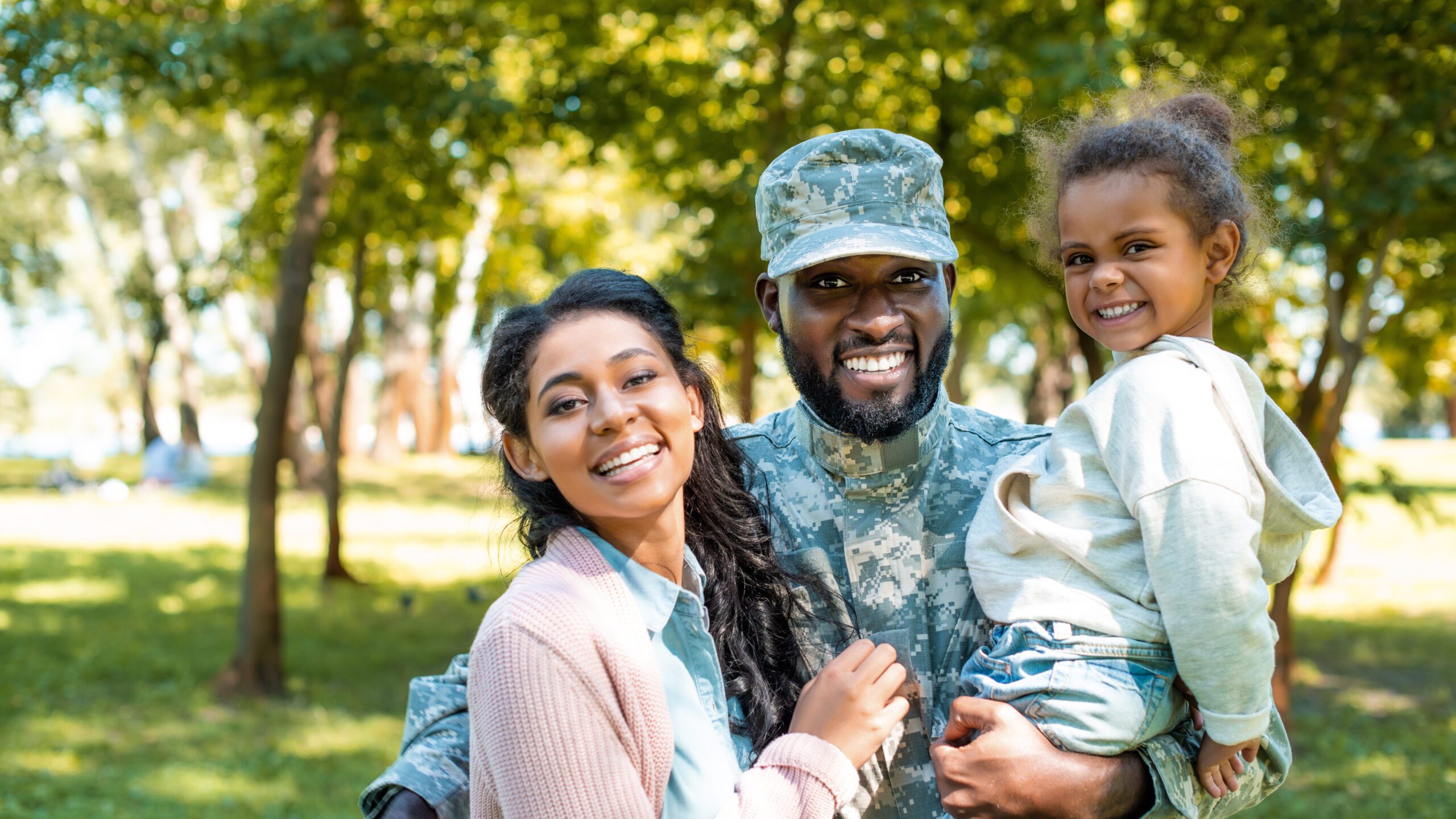 Military Family smiling.